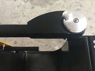 Lift armrest with steering hand wheel